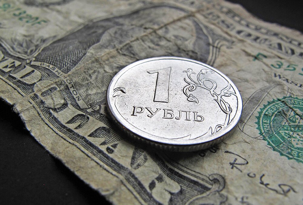Курс доллара на 25.12.2014: Доллар упал ниже 54 рублей впервые с 8 декабря